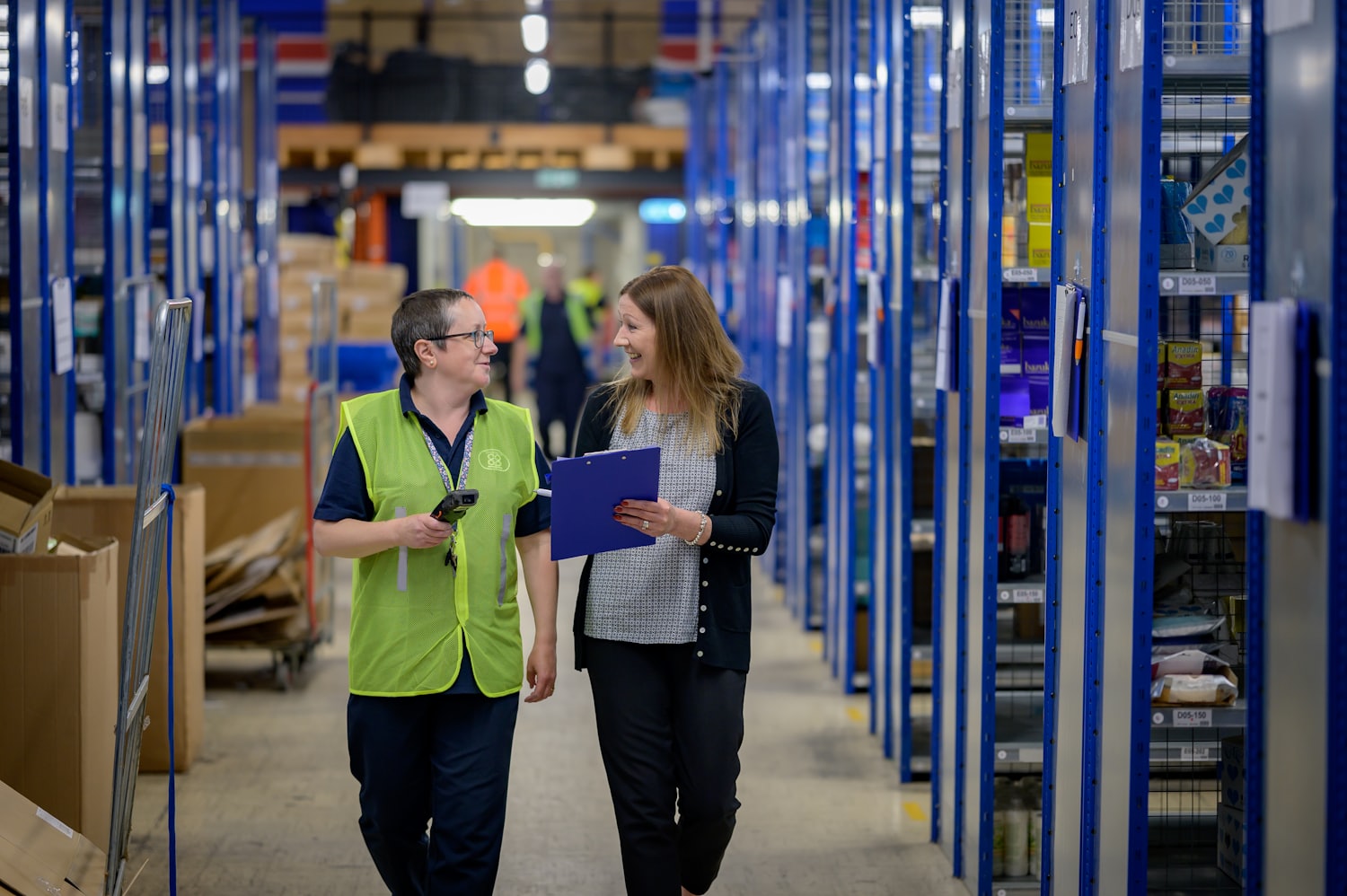 Avail Systems team helping a customer in a stockroom